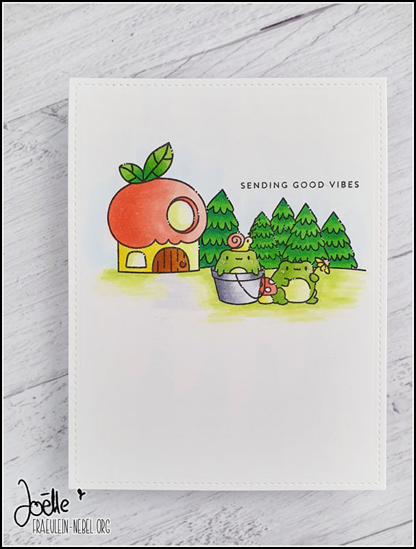 Grußkarte "sending good vibes" mit Stempeln von Mama Elephant, zu sehen sind zwei Frösche vor einem Haus mit Apfel-Dach, im Hintergrund stehen Tannen | fraeulein-nebel.org
